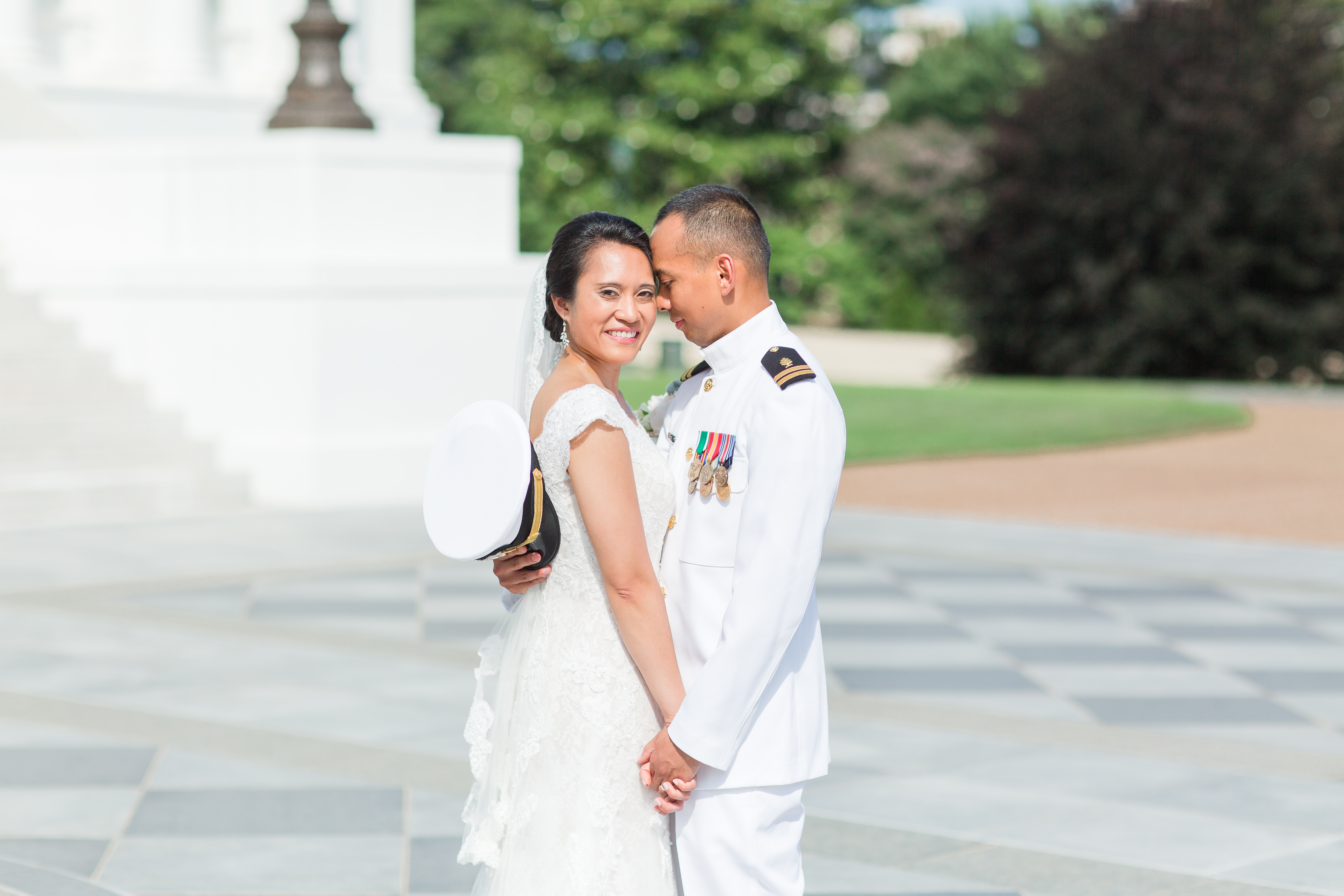 bride and groom portraits at the virginia state capital building along the stairs and front of the building